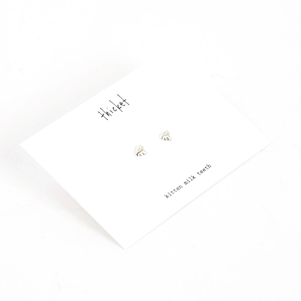 Cast Kitten Teeth Studs