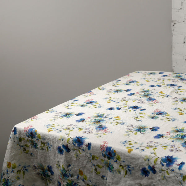 Flowers on White Linen Tablecloth
