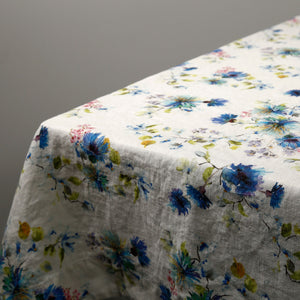 Flowers on White Linen Tablecloth