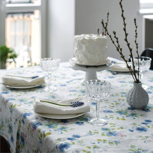 Flowers on White Linen Tablecloth